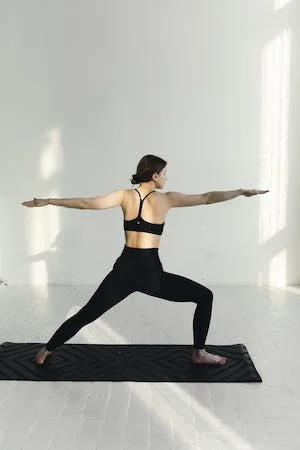 A lady with yoga pose